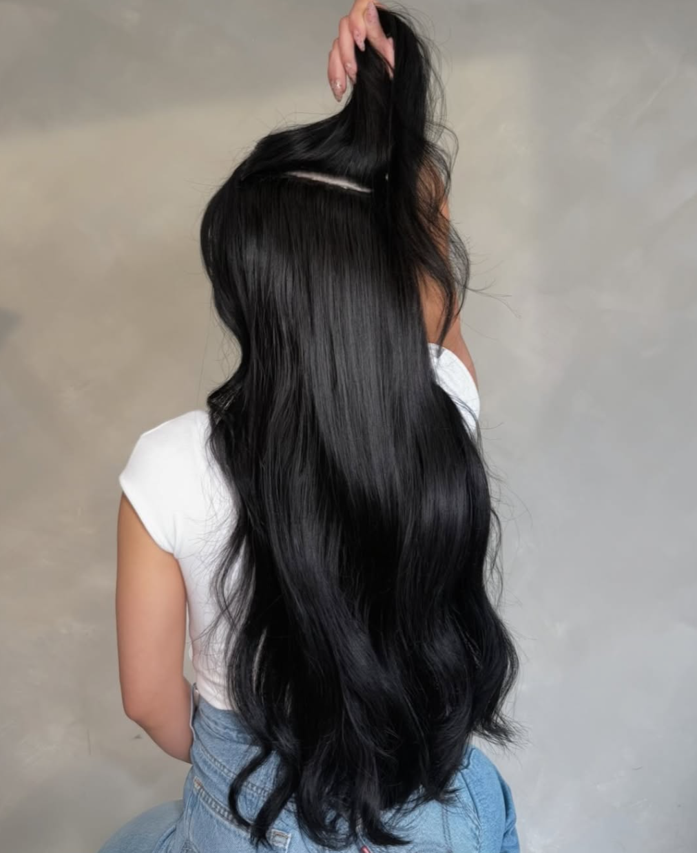 Long dramatic black hair extensions